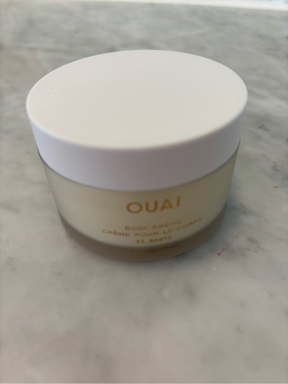 OUAI St. Barts Body Crème in white and cream